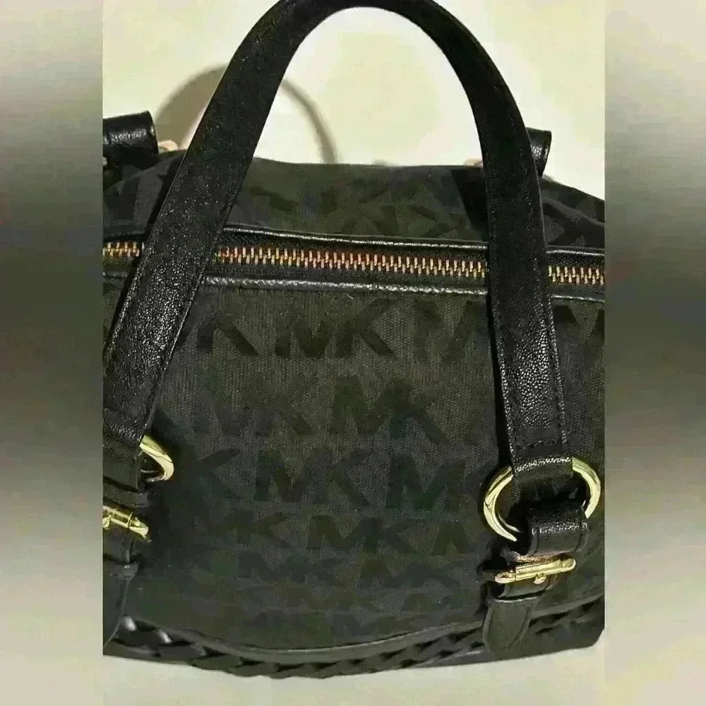A Mickael Kors black Gladstone satchel with gold tone hardware. - Picture 3 of 14